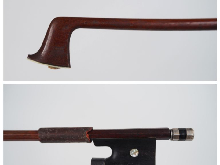 Archet 	de violon Mirecourt anonyme  en pernambouc monté argent	. XIXè