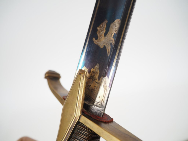 Sabre d’officier de cavalerie légère.  Poignée filigranée de laiton. M