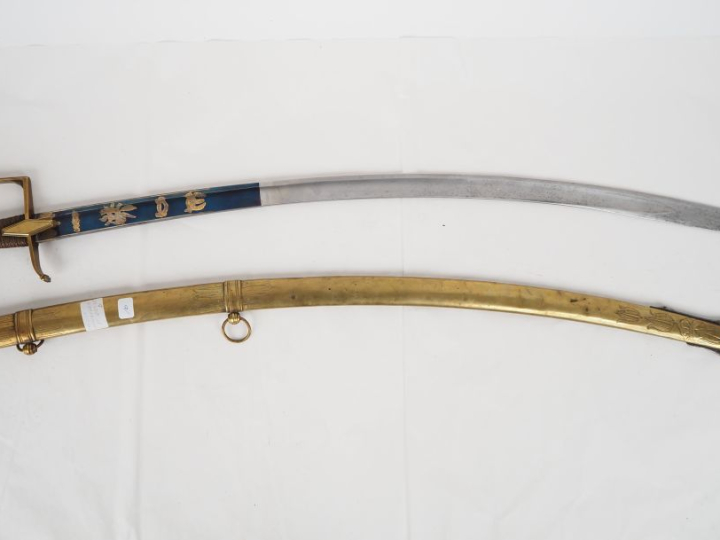 Sabre d’officier de cavalerie légère.  Poignée filigranée de laiton. M