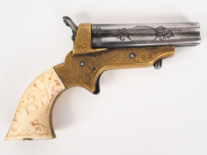 Pistolet Sharps miniature, quatre coups.  Bloc de quatre canons gravés