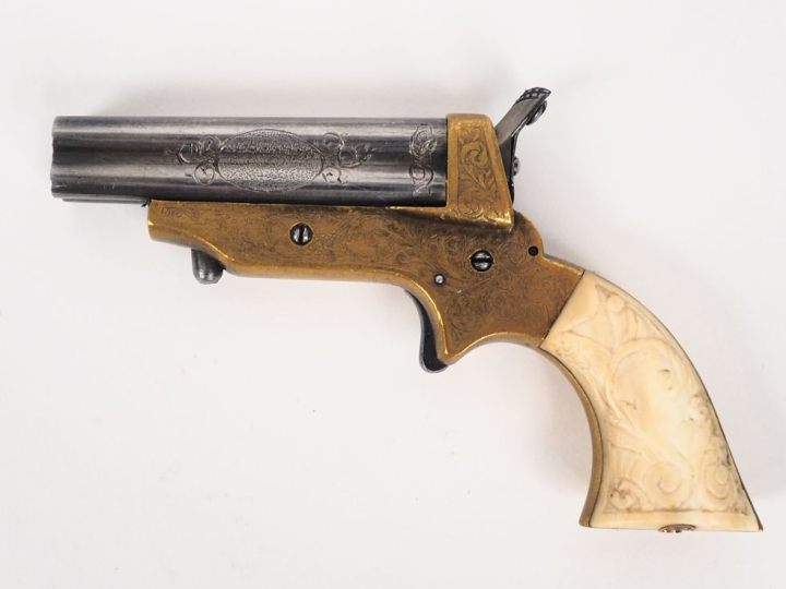 Pistolet Sharps miniature, quatre coups.  Bloc de quatre canons gravés
