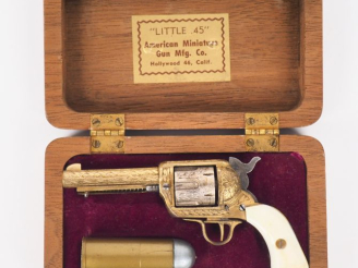 Vente aux enchères Revolver Colt Single action army miniature.  Canon et barillet gravé d