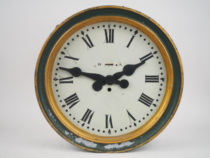 Enseigne de magasin début Xxème composée de deux horloges double face 