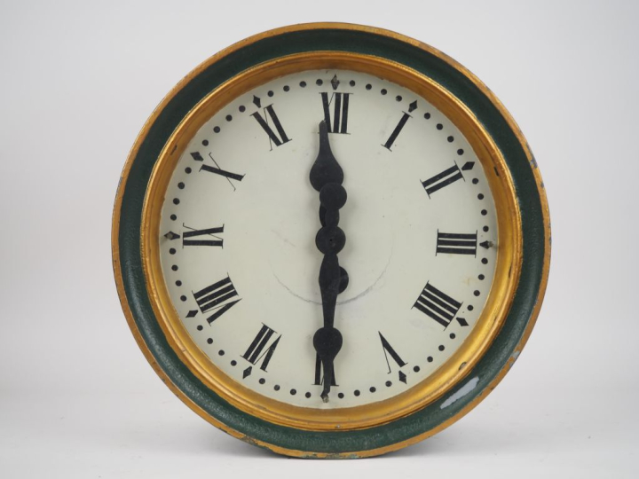 Enseigne de magasin début Xxème composée de deux horloges double face 