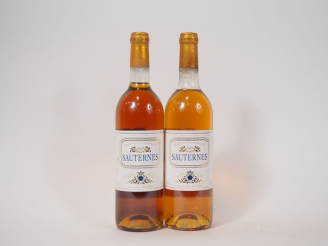 Vente aux enchères 2 BOUTEILLES MAISON JOHANES BOUBÉE SAUTERNES - 2001