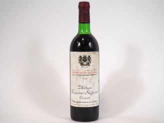 Vente aux enchères 1 BOUTEILLE CHÂTEAU BEAU SÉJOUR BÉCOT 1er GCC ST EMILION - 1976 - LB/B