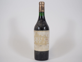 Vente aux enchères 1 BOUTEILLE CHÂTEAU HAUT BRION 1er GCC GRAVES - 1986 - EF/BS