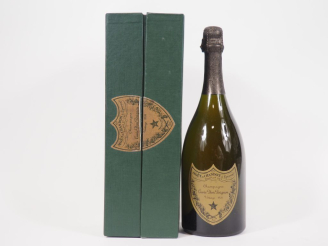 Vente aux enchères 1 BOUTEILLE CHAMPAGNE DOM PÉRIGNON - 1976 - COFFRET