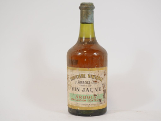 Vente aux enchères 1 BOUTEILLE VIN JAUNE FRUITIÈRE VINICOLE D'ARBOIS - 1975 - BS - ETA 