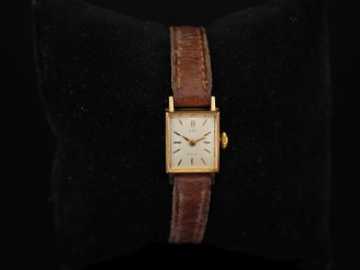 Vente aux enchères S.F.L Montre bracelet de dame, boitier en or jaune 750.  Cadran à inde