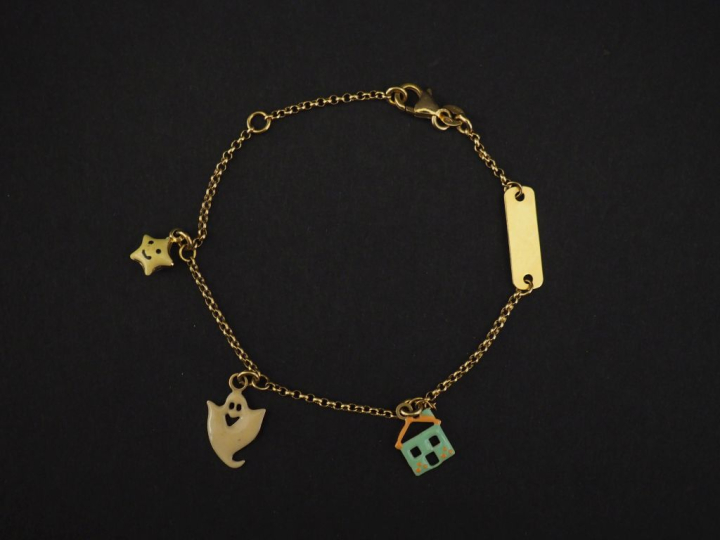 Bracelet souple en or jaune 750, maille jaseron, agrémenté de de trois