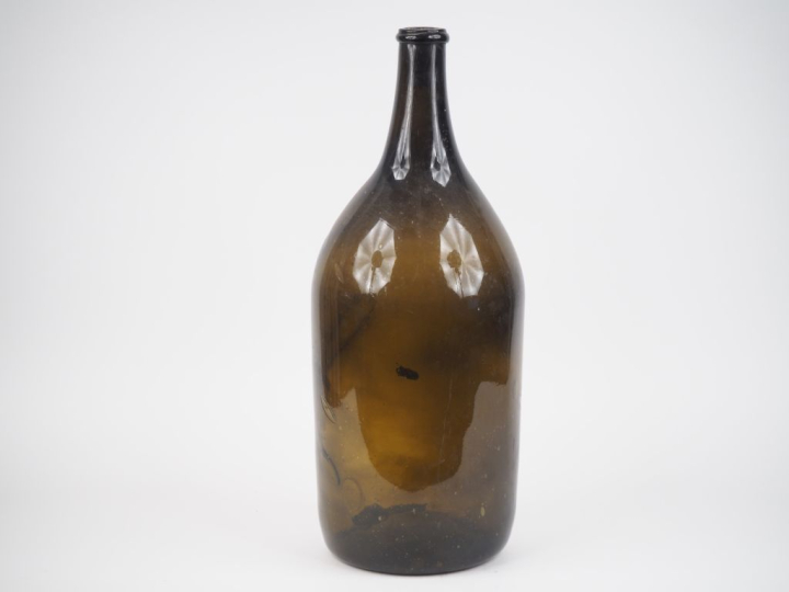 Grande damejeanne en verre soufflé.  H. 56 cm