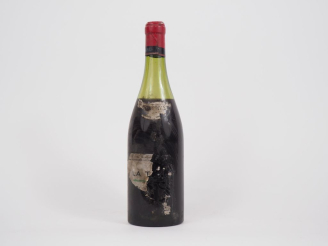 Vente aux enchères 1 BOUTEILLE LA TACHE DOMAINE DE LA ROMANÉE CONTI - NM/ETA/CAPS LÉGER A