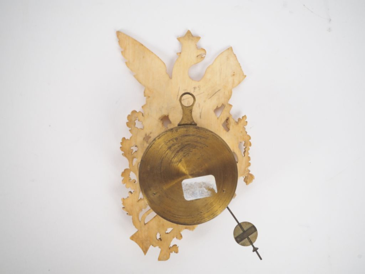 Cartel miniature début XIXème en ivoire à décor sculpté et ajouré de f