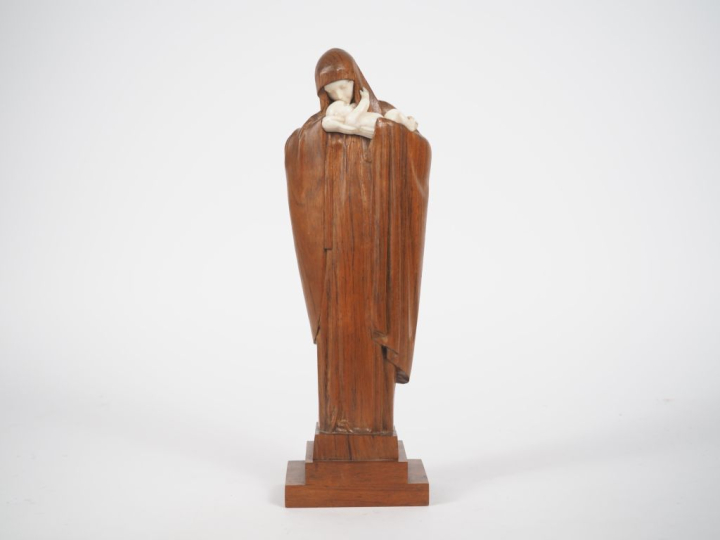 HEUVELMANS. 'Vierge à l'enfant'.  Scuplture chryséléphantine. Signée. 