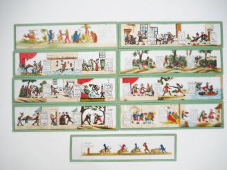 Vente aux enchères 9 différentes plaques pour lanterne magique. Dim 7 x 27 cm.