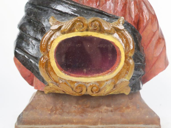 Reliquaire en bois sculpté polychrome figurant un buste d'homme, ajour