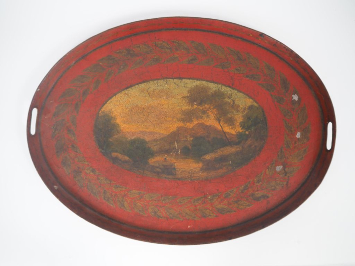 Plateau début XIXème en tôle polychrome à décor de paysages sur fond r