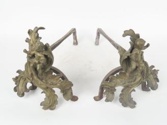 Vente aux enchères Paire de chenets Napoléon III de style Louis XV en bronze à décor de p