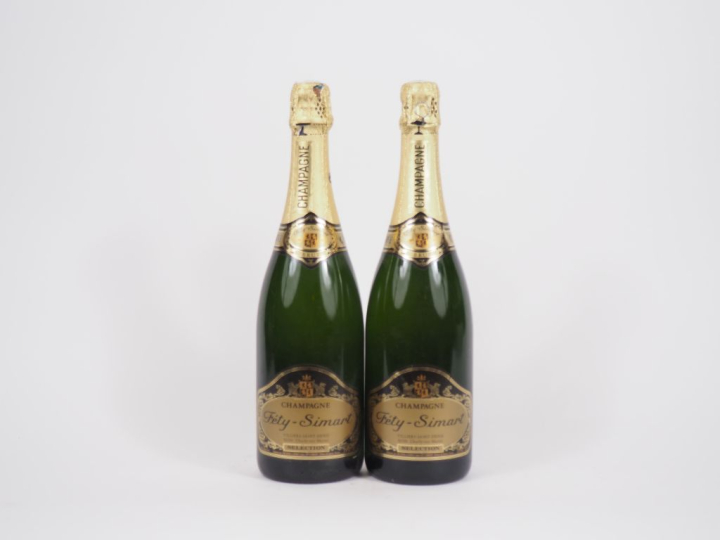2 BOUTEILLES CHAMPAGNE FÉTY SIMART - 1 CAPS LEGER ABIMÉE