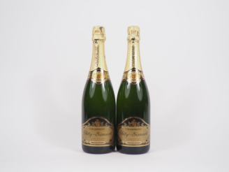 Vente aux enchères 2 BOUTEILLES CHAMPAGNE FÉTY SIMART - 1 CAPS LEGER ABIMÉE