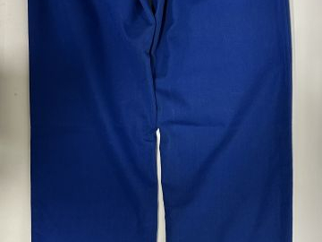 VERSACE Veste en coton (98%) de couleur turquoise.  Fermeture à l'avan