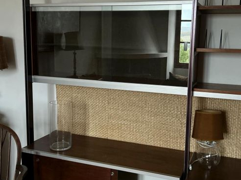 HERMAN MILLER.  Bibliothèque ou étagère en métal verre et bois. (A rem