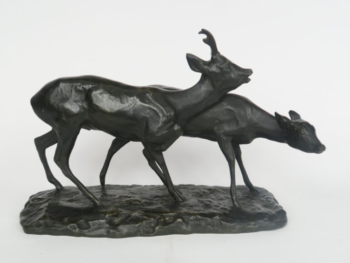 CHRISTOPHE.  "couple de chevreuils" Groupe en bronze à patine brune  S
