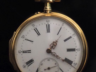 Vente aux enchères GENEVE Montre de gousset en or jaune 750.  Cadran à chiffres romains p