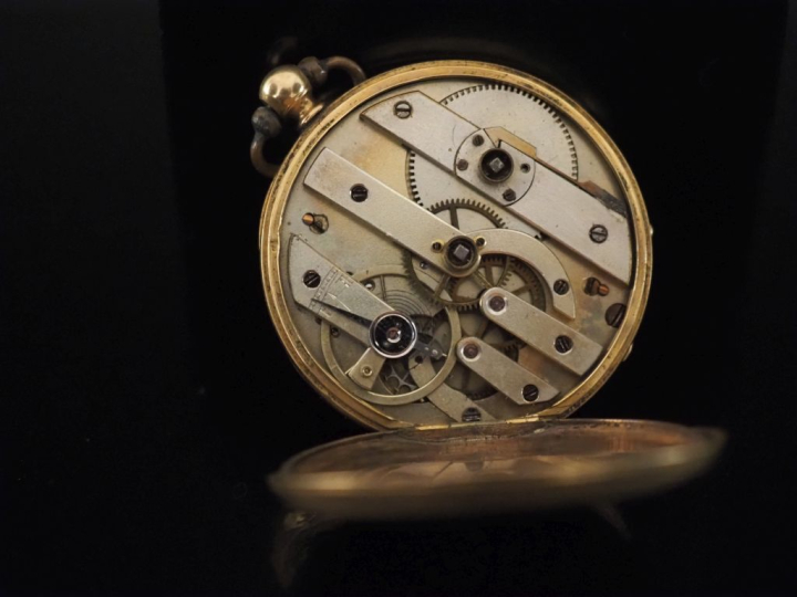 Montre de gousset en or jaune 750.  Cadran à chiffres romains pour les