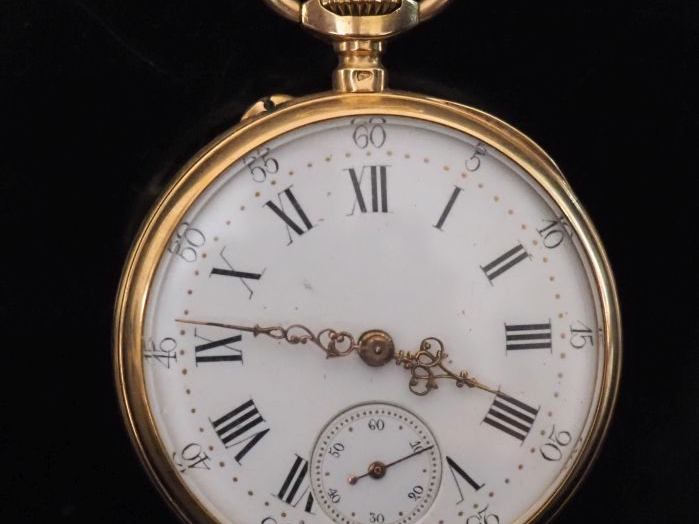 Montre de gousset en or jaune 750.  Cadran à chiffres romains pour les