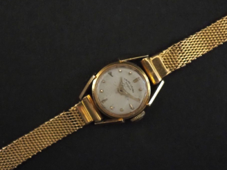 Vente aux enchères FAVRE - LEUBA Montre bracelet de dame, boitier et bracelet en or jaune