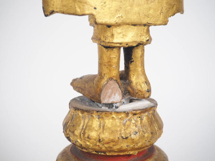 Laos, XIXe siècle,  Statuette en bois laqué doré, représentant bouddha