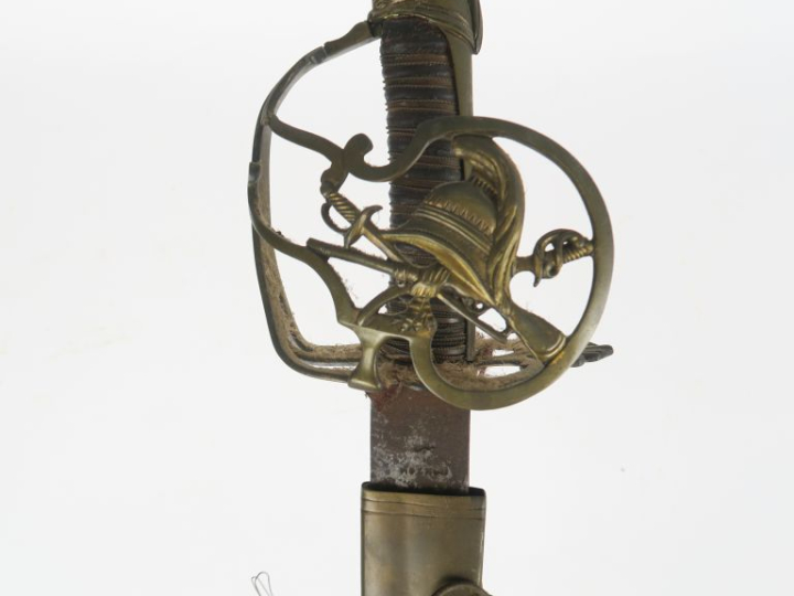 Sabre d’officier volontaire.  Poignée recouvert de cuir avec filigrane