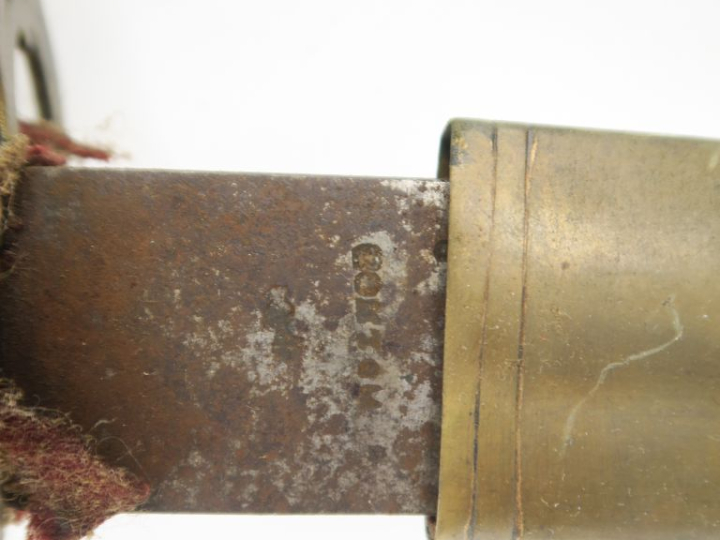 Sabre d’officier volontaire.  Poignée recouvert de cuir avec filigrane