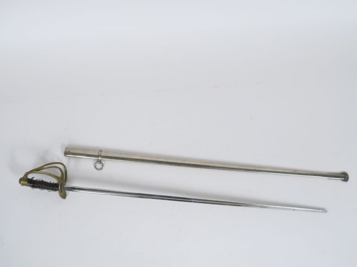 Sabre d’enfant type officier 1822. Poignée en bois verni (reste de fil