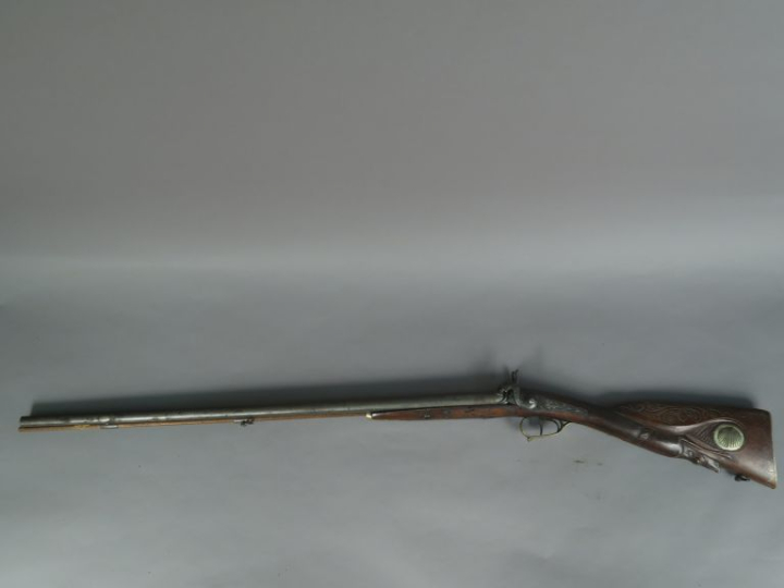 Fusil à percussion, deux coups.  Canons en table. Garnitures en métal 