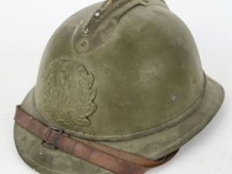 Vente aux enchères Casque Adrian du commerce du service de Santé.  En liège peint en kaki