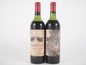 Vente aux enchères 2 BOUTEILLES CHÂTEAU CANON 1er GCC ST ÉMILION - 1975 - 1 HEP/1 MEP/1 E