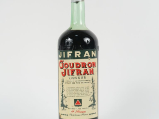 Vente aux enchères 1 VIEILLE BOUTEILLE (1 L) GOUDRON JIFRAN - CAPS ETAIN