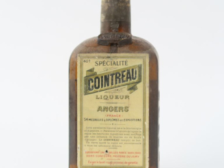 Vente aux enchères 1 VIEILLE BOUTEILLE COINTREAU 40° - NIVEAU BAS/BS