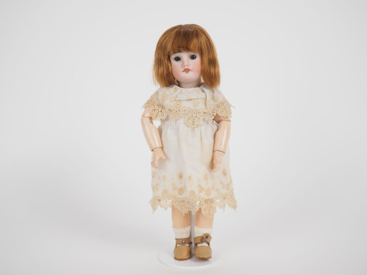 Poupée Bleuette Fleischmann, tête porcelaine bouche ouverte yeux fixes