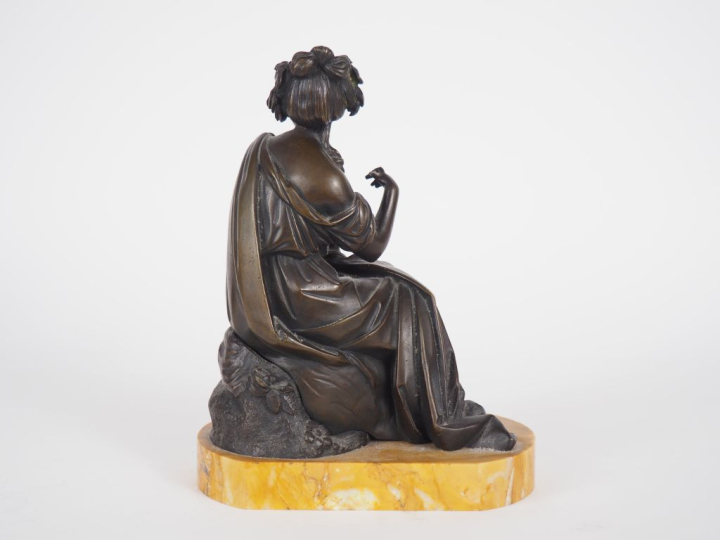 PIGALLE. (D'après)  Sculpture en bronze à patine brune "figure allégor