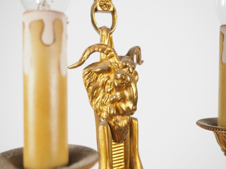 Paire d'appliques doubles de style Louis XVI en bronze doré à décor de