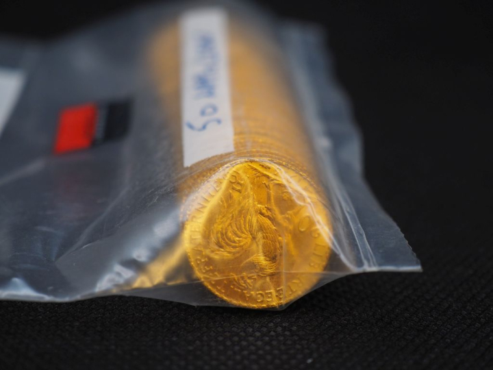50 pièces de 20 Francs or (une date visible 1913) Dans un sachet sous 