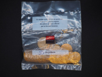 Vente aux enchères 50 pièces de 20 Francs or (une date visible 1909) Dans un sachet sous 