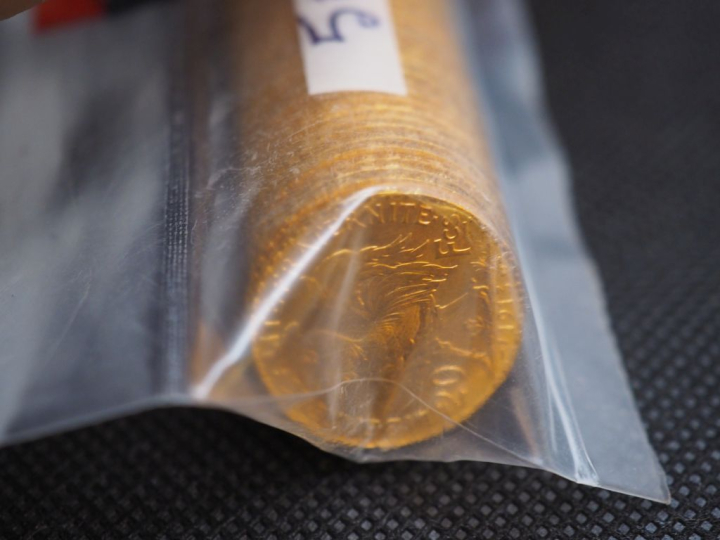 50 pièces de 20 Francs or (une date visible 1913) Dans un sachet sous 