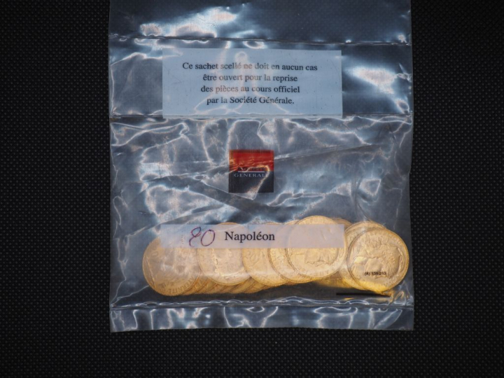20 pièces de 20 Francs or (date visible 1909) Dans un sachet sous scel