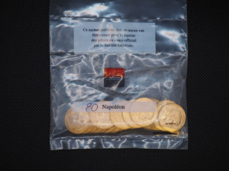 Vente aux enchères 20 pièces de 20 Francs or (date visible 1909) Dans un sachet sous scel