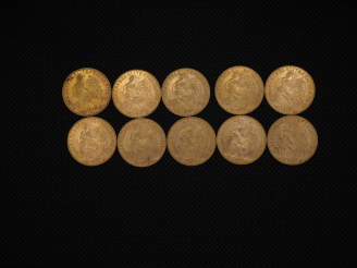 Vente aux enchères 10 pièces de 20 Francs or : 1909, 1910, 1905, 1913, 1910, 1910, 1912, 